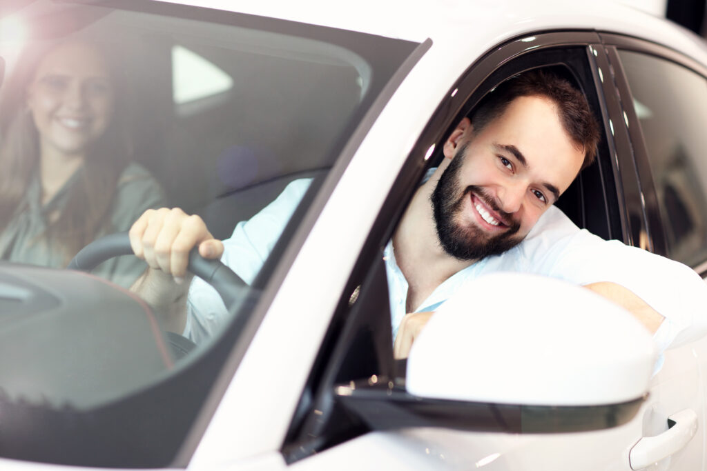 30 year old couple sitting in car